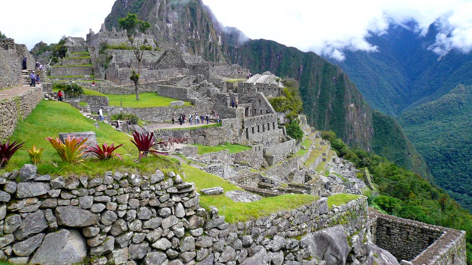 Hikers overlooking Machu Picchu after completing the Inca Trail